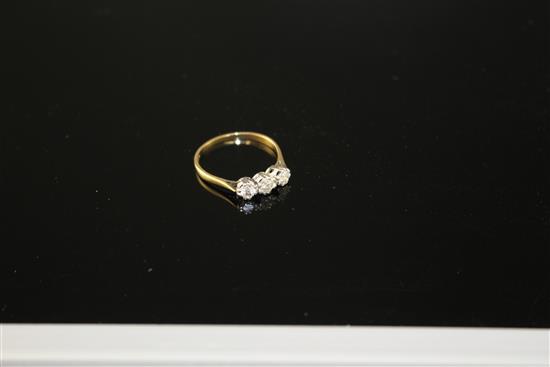 An 18ct and Plat, three stone diamond ring, size P, gross weight 1.8 grams,